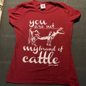 Red your not my kind of cattle T-shirt and it’s a small.